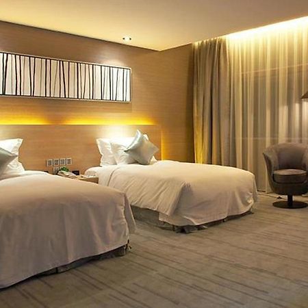 Logosun Hotel Ухан Екстериор снимка